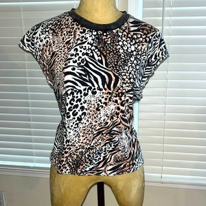 Free People movement women’s Safari print top. Smoke free home. Size small.